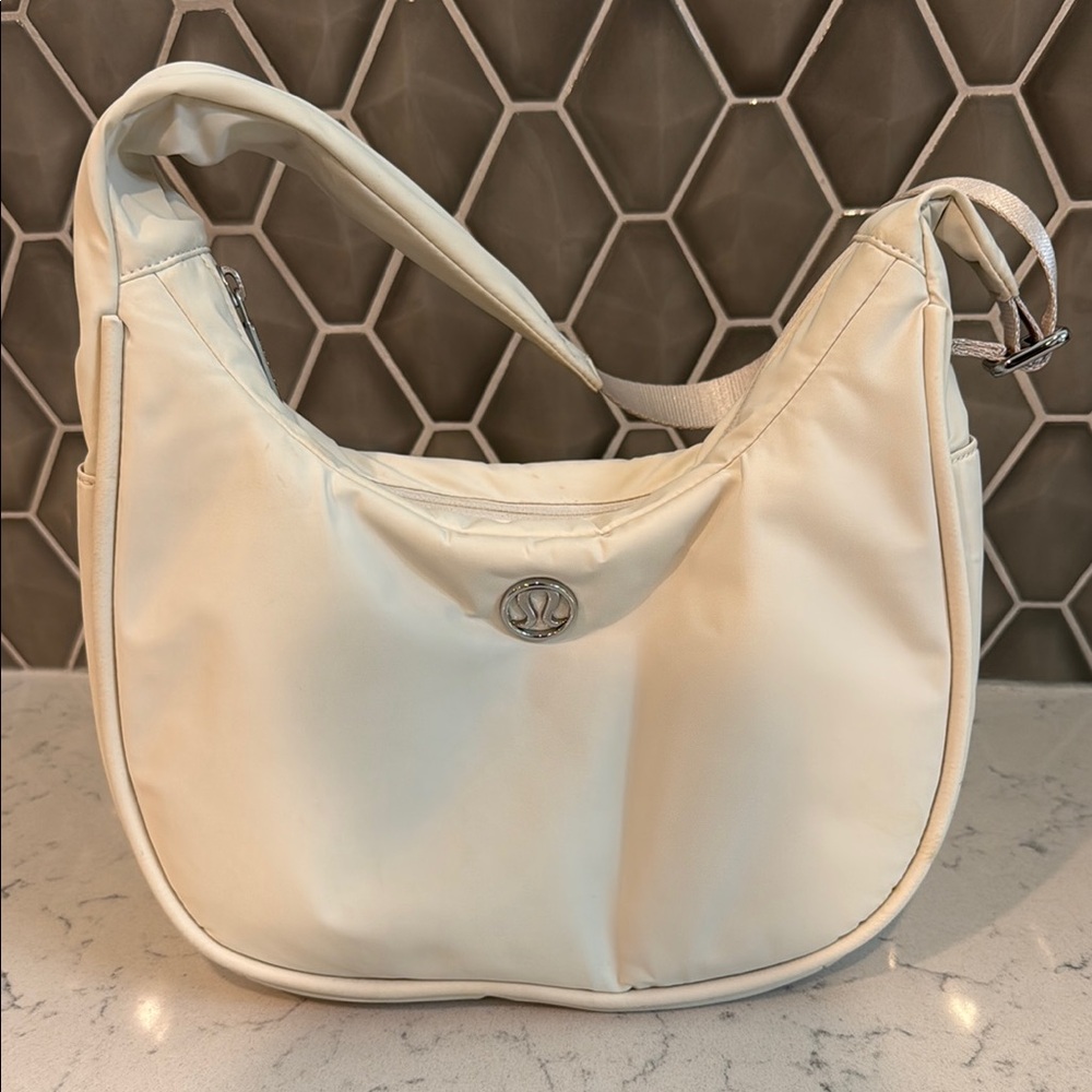 Lululemon Athletica Cream Hobo Bag with Soft Curved Design
